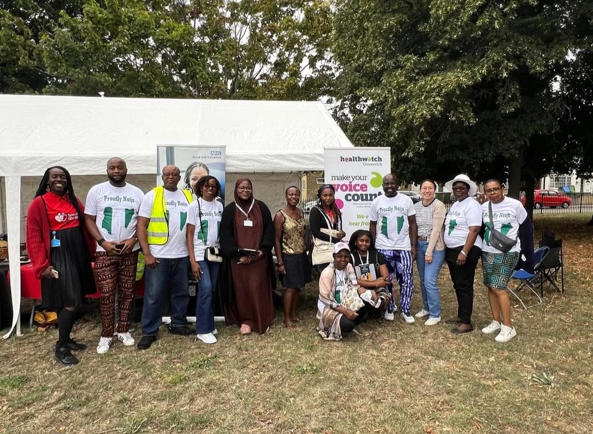 The Healthwatch Greenwich team at an outdoor community event, Sofiat fifth from left in a brown hijab